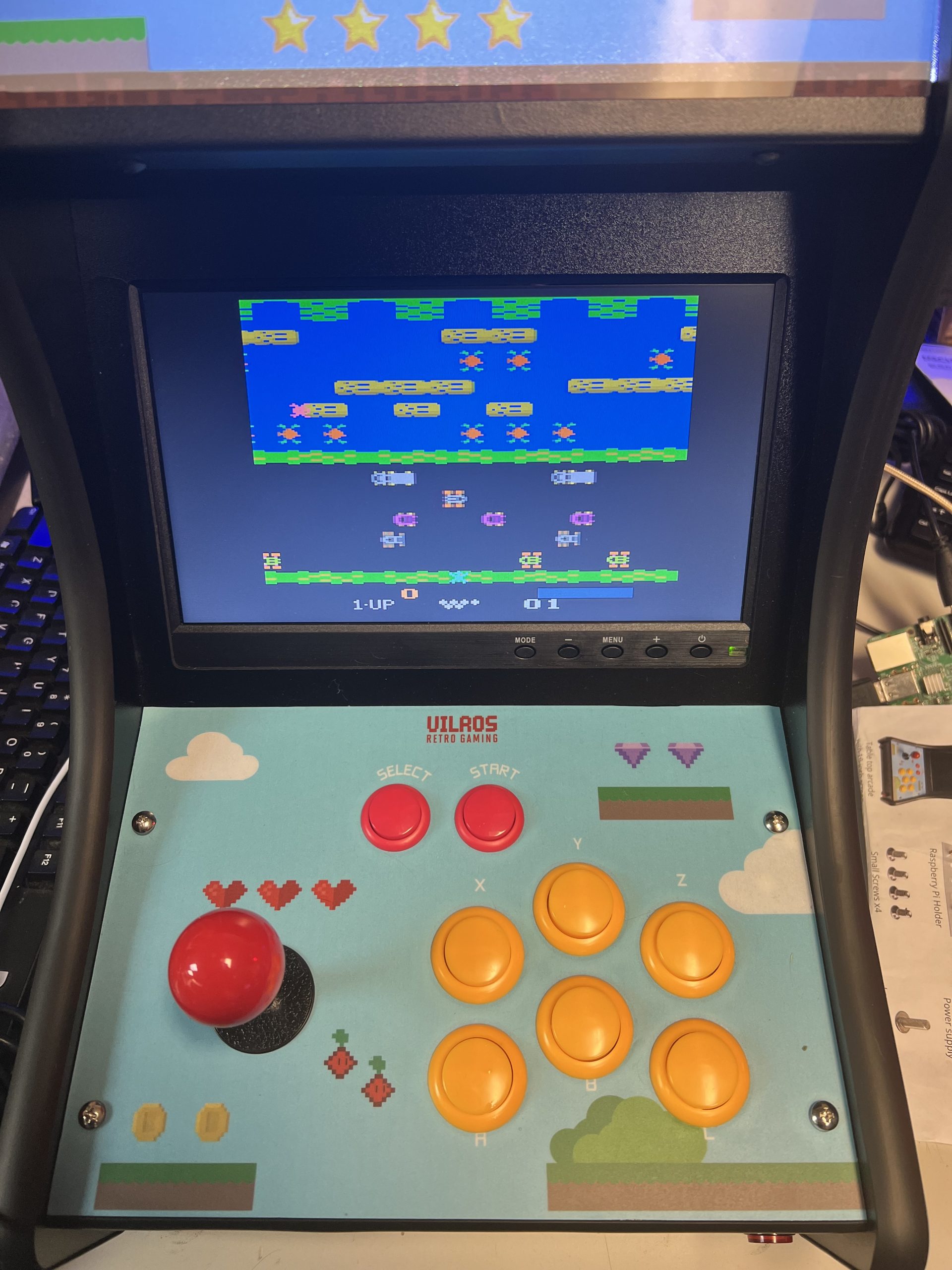 Raspberry Pi retro arcade cabinet running Frogger game built at Plum Crazy Robotics lab
