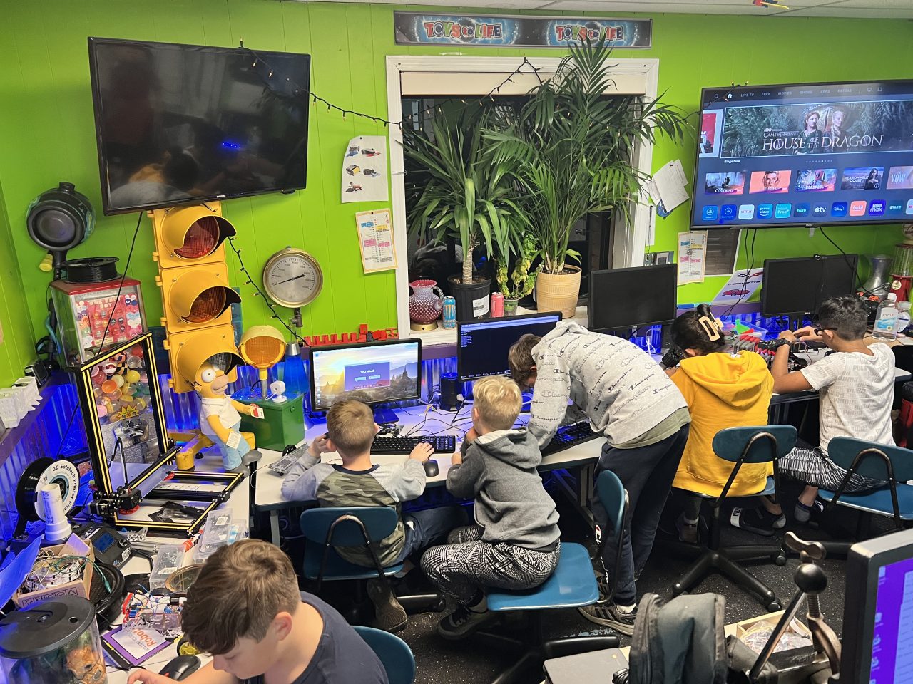 Full classroom of students working at computer stations during STEM class at Plum Crazy Robotics Marlboro NJ